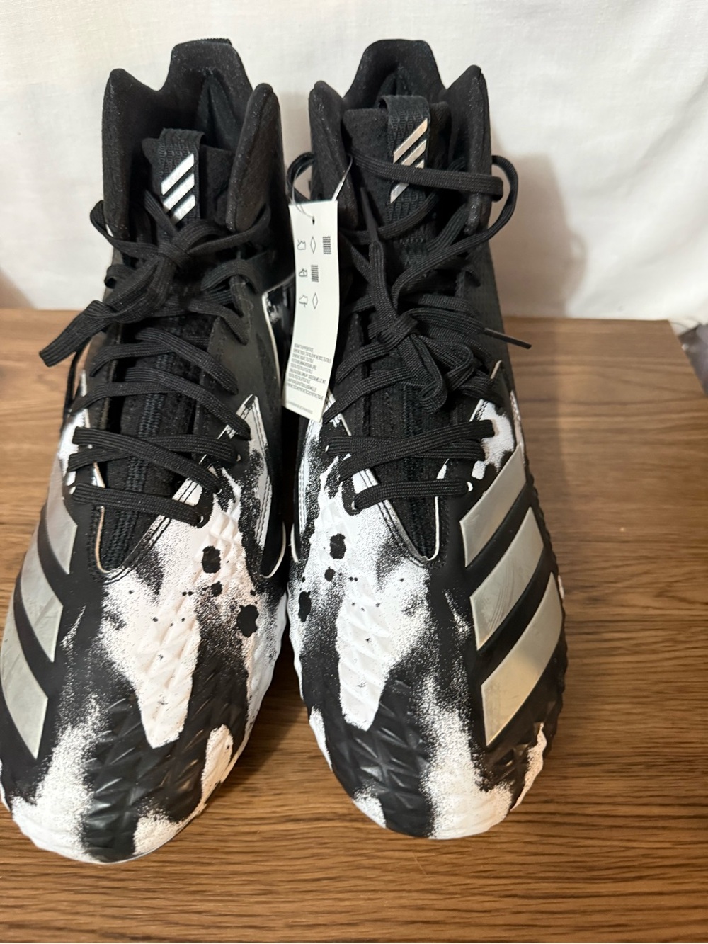 adidas men’s Black and White High-Top Sneakers